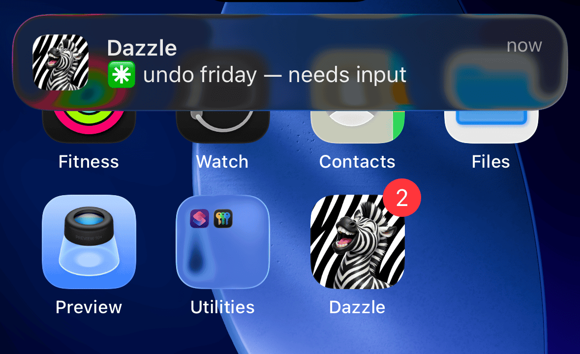 A Dazzle notification on a phone home screen naming the session that needs an answer, beside a badged app icon.